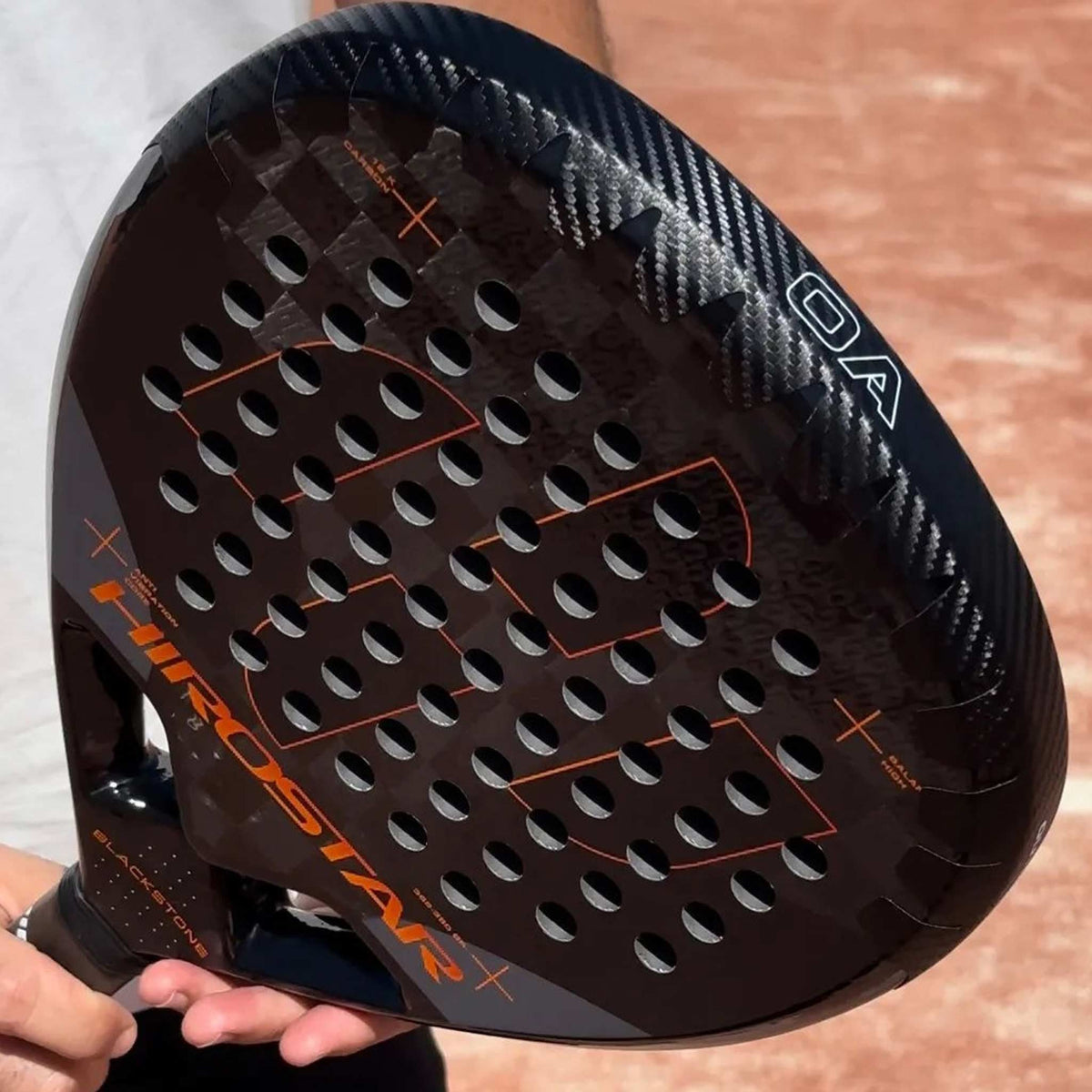 Outer Armour Frame Protector, Black - fitted to the head of a padel racket on court
