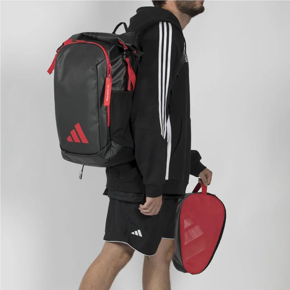 2026 Adidas Multigame padel backpack (Black/Red) - worn on the back by a player
