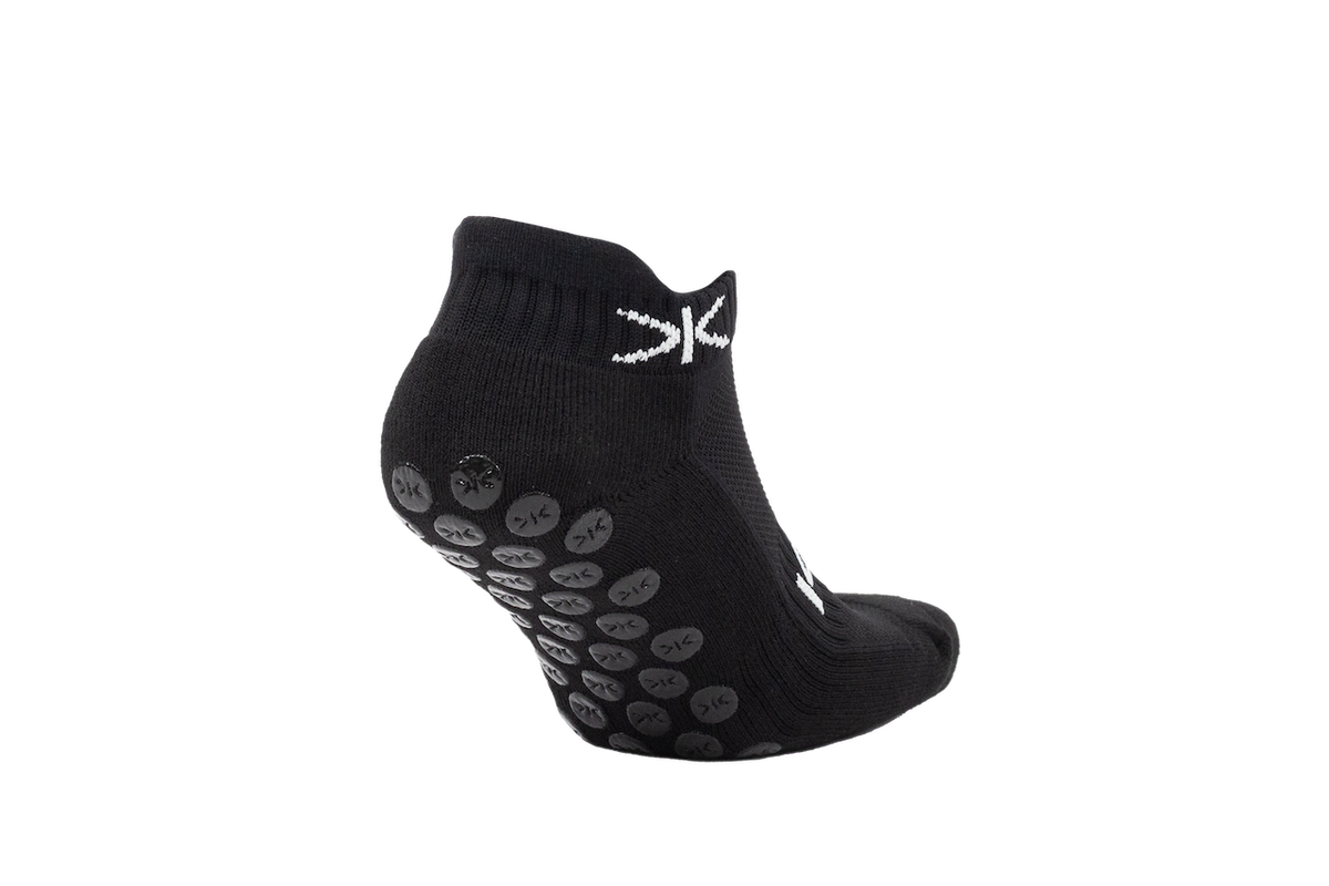 Kupe Secretsock Black - angled view showing the logo on the heel tab