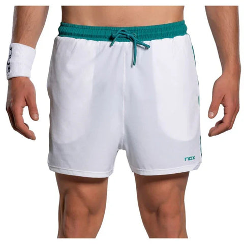 2026 Nox Pro men's padel shorts (White/Ivy Green) - front view