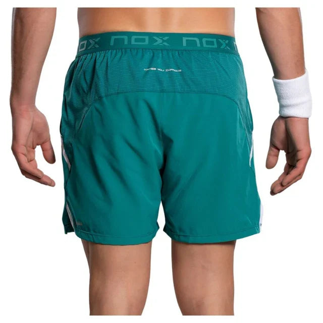 2026 Nox Pro men's padel shorts (Ivy Green) - back view with logo waistband