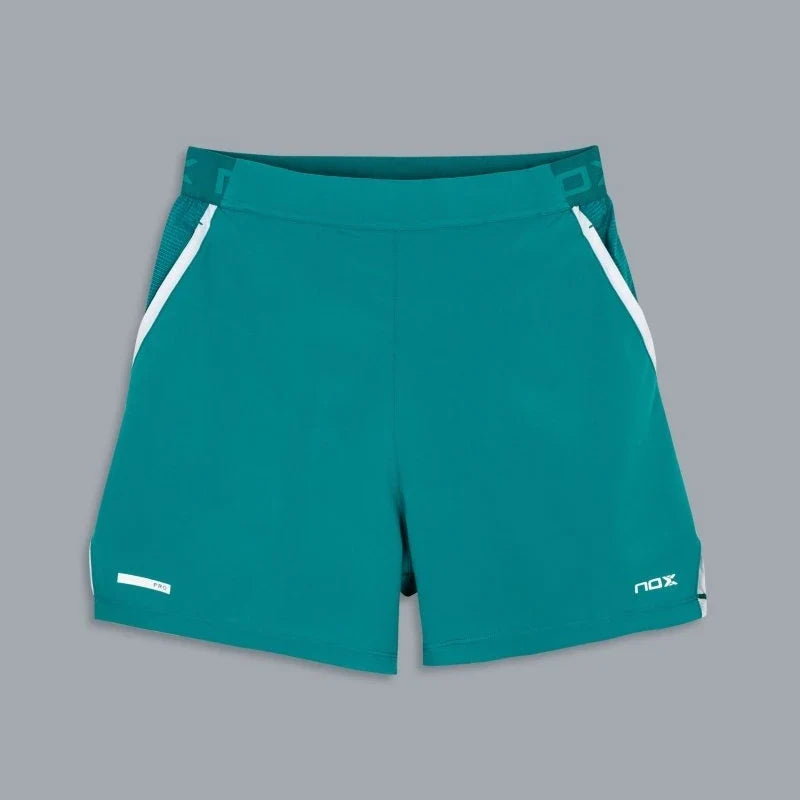 2026 Nox Pro men's padel shorts (Ivy Green) - flat front view