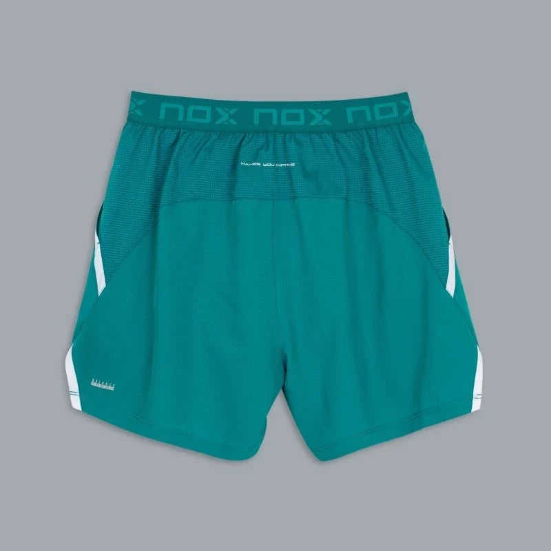 2026 Nox Pro men's padel shorts (Ivy Green) - flat back view