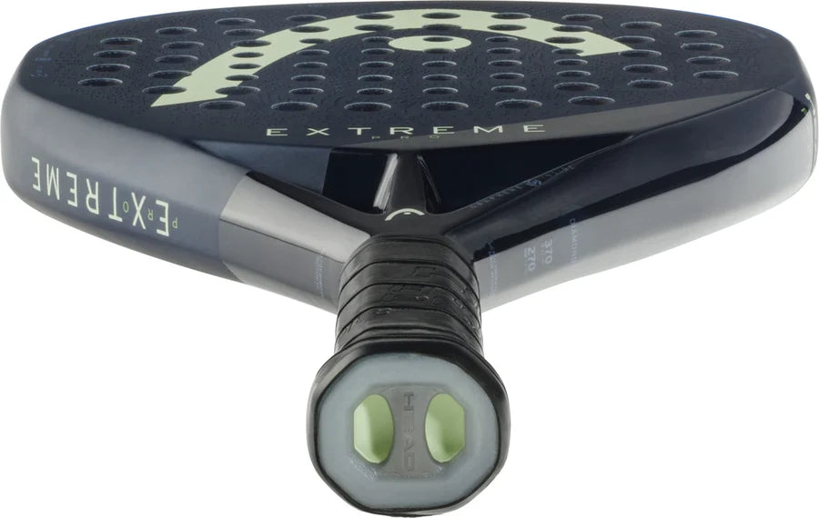 Head Extreme Pro padel racket - laid flat with a padel ball alongside